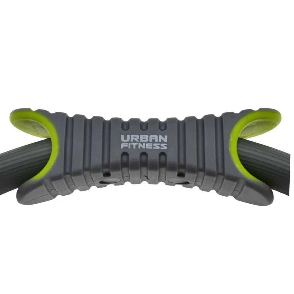 Urban Fitness 14 inch pilates ring with gray textured body and neon yellow handles on black grip straps, front view against white background