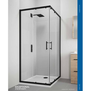 Flair Verve Pro corner entry shower enclosure with matt black frame and clear glass panels in modern bathroom setting with white tiles and wooden vanity unit