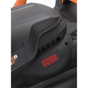 Close-up of WorX WG733E 20V cordless lawnmower showing black brushless motor housing with red brushless motor label, gray deck, and orange accents on the handle, viewed from the side detail perspective