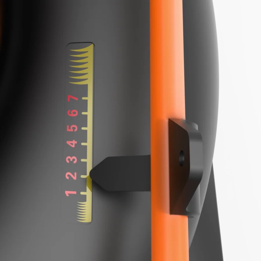 Close-up of Worx WG749E 46cm lawn mower showing integrated tape measure on grey housing with orange trim and black measurement guide displaying centimeter markings from 1 to 7