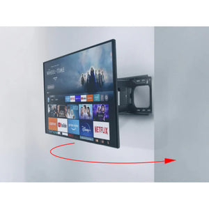 Black full motion TV wall bracket mount with red curved arrow indicating swivel movement, holding a flat-screen television displaying streaming service apps including Netflix and Disney+, mounted on white wall with gray corner trim