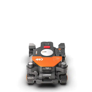 Top-down view of Worx Landroid Vision AI RTK 4WD robotic lawn mower with orange and black chassis, featuring red emergency stop button, white circular sensor dome, chunky treaded wheels, and VSLAM vision system, isolated on white background