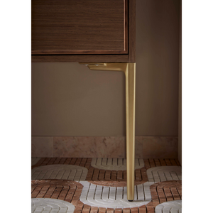 Walcot vanity unit detail showing brass handle against dark walnut wood cabinetry and brick flooring