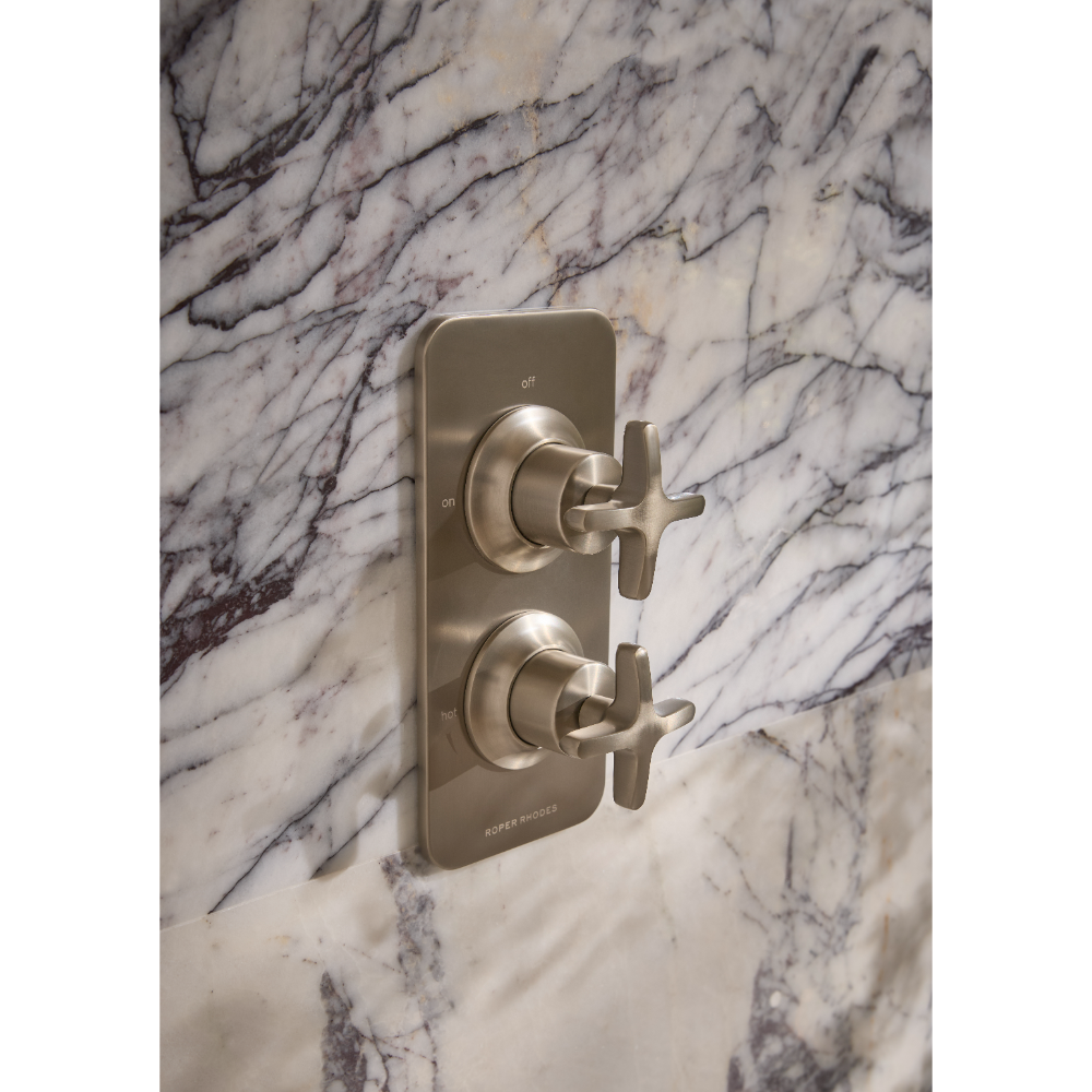 Roper Rhodes Walcot concealed shower valve in brushed nickel with dual cross handles mounted on white Carrara marble tile wall