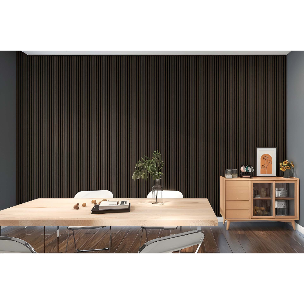Acoustic wall panels in ebony vertical ribbed finish installed in modern office space with light wood dining table, white chairs, natural wood cabinet with glass doors, potted plant and minimalist decor