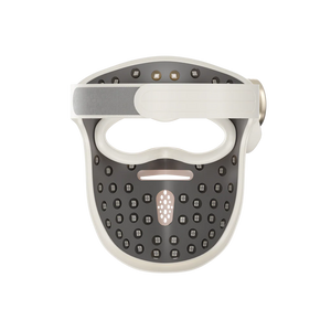 Dreame Chrona LED Face Mask in white and dark grey featuring multiple LED light points on top and ventilation holes across the front panel, front-facing view against white background