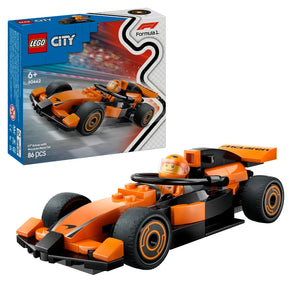 LEGO City Formula 1 set 60442 featuring an orange and black McLaren race car with a minifigure driver, displayed next to its blue retail box showing the completed model and 86 piece count