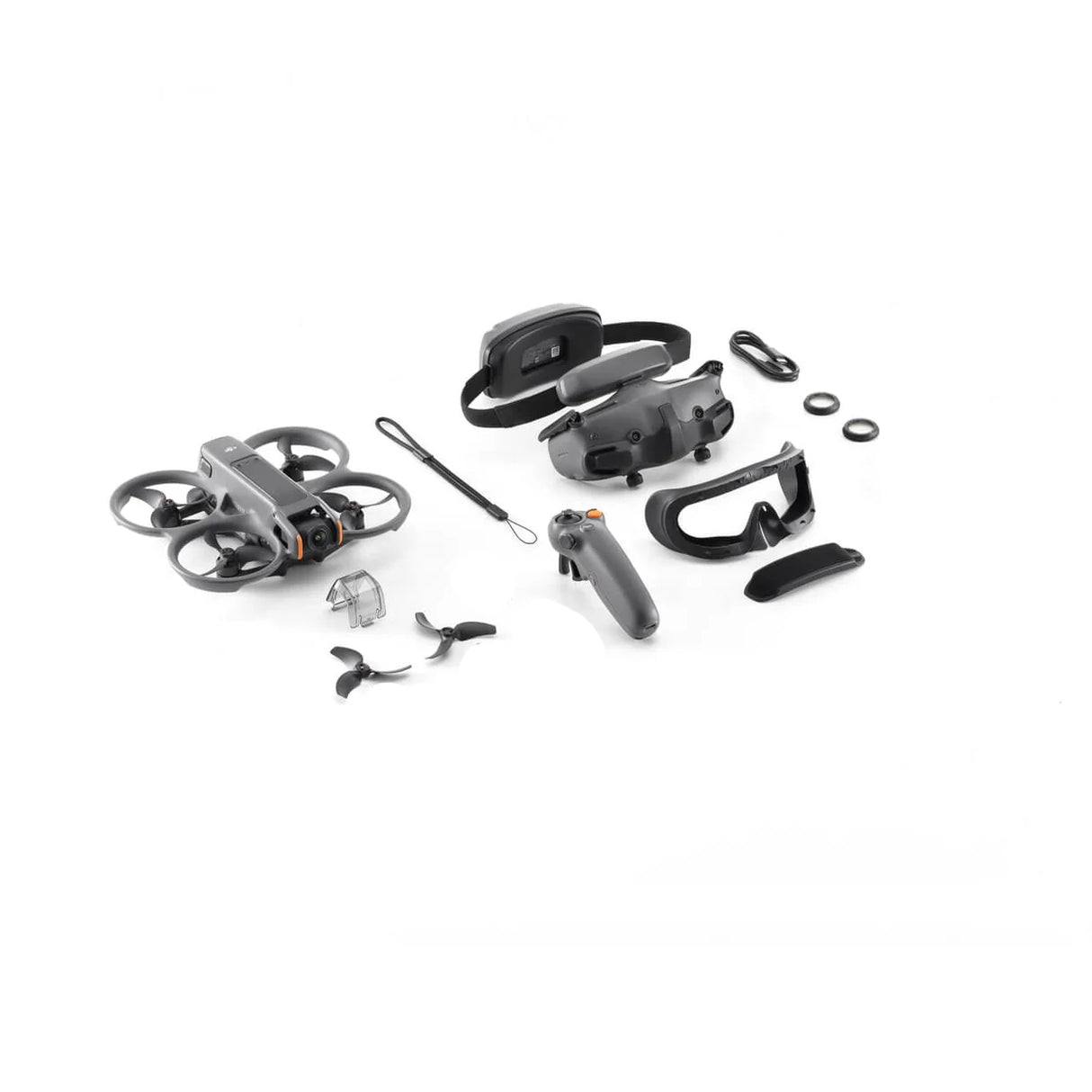 DJI Avata 2 FPV drone Fly More Combo with gray and black components including quadcopter with propeller guards, remote controller, FPV goggles, battery, propellers, and accessories laid out on white background