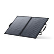 Anker SOLIX PS100 bifacial portable solar panel with two black-framed panels connected by hinges, featuring grey solar cells in a grid pattern, equipped with carrying handles, shown at an angled position against a white background