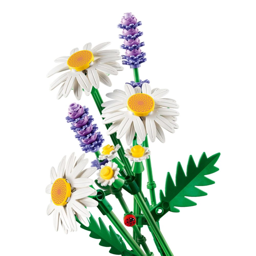 LEGO Daisies set 11508 featuring white petaled flowers with yellow centers, purple lavender blooms, green stems and leaves, and a small red ladybug detail on a white background