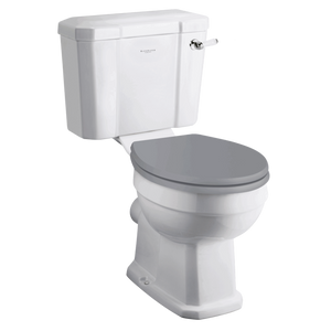 White ceramic close coupled toilet with grey soft-close seat and cistern with chrome flush handle, classic traditional design