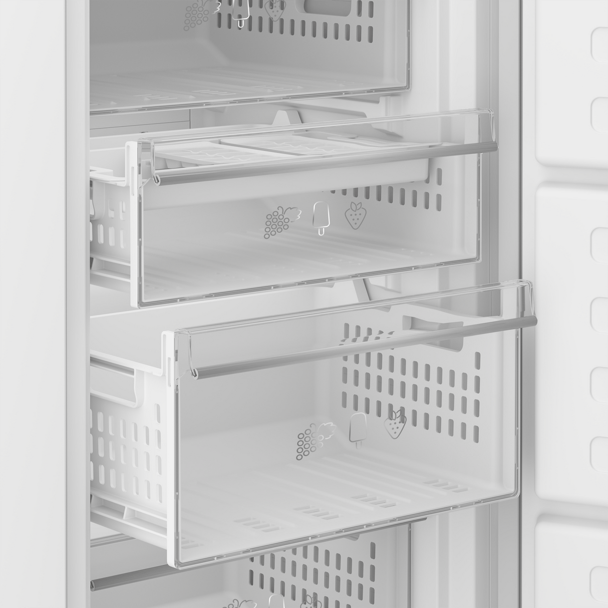 Interior view of a Blomberg integrated frost-free freezer showing multiple clear glass shelves and pull-out drawers with ventilation slots, featuring fruit and ice cream icons on drawer fronts, white trim and handles against a stainless steel finish