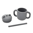 Gray children's cup with handles, lid, and straw on a white background