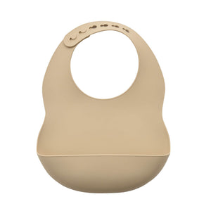 Beige silicone baby bib with integrated bowl and adjustable neck closure featuring feeding scoop attachment
