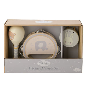 Bambino Wooden Musical Set for babies featuring a cream drum with elephant design, wooden rattle with bear motif, and bunny-shaped shaker in neutral tones, displayed in cardboard packaging labeled for ages 3+