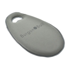 Gray foam kneeling mat with handle by Burgon and Ball, featuring oval shape and embossed branding on soft padded surface