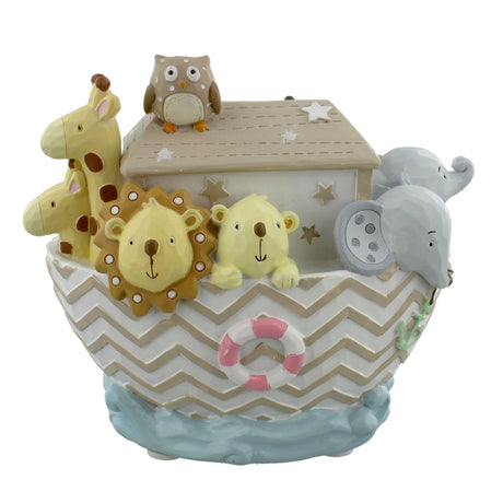 Decorative toy Noah's Ark with animal figures on a white background