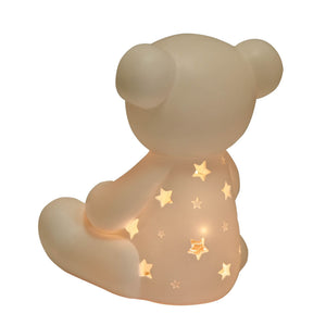 Cream-colored light up teddy bear night light with golden star pattern on belly, soft rounded design suitable for children's bedroom