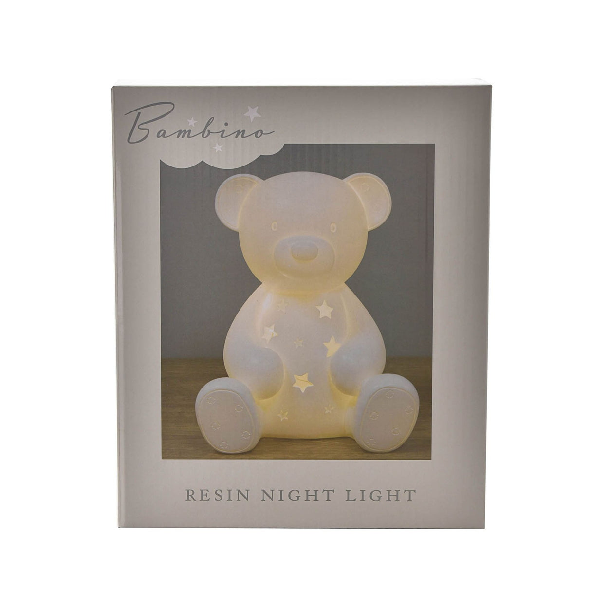 Bambino resin night light in the shape of a cream-colored teddy bear with star cutouts and glowing interior, displayed in branded packaging