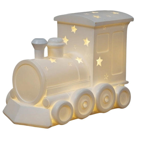 Train-shaped night light with star patterns on a white background
