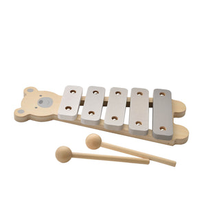 Bambino wooden toy xylophone featuring a natural wood teddy bear-shaped base with five metal keys in white and grey tones, complete with two wooden mallets with round heads