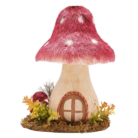 Fairy house shaped like a mushroom with a red cap on a white background