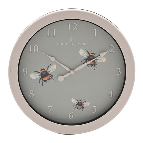 Wall clock with bee design on a gray background, brand 'Country Living' visible