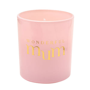 Pink cylindrical scented candle with gold foil text reading "wonderful mum" and a white wick visible at the top