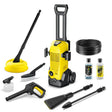 Kärcher K3 Eco!Booster yellow and black pressure washer with complete accessory kit including spray gun, hose, cleaning solutions, brush attachment, surface cleaner and extension lance displayed against white background