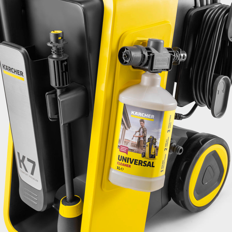 Karcher pressure washer with a bottle of Karcher universal cleaner on a white background