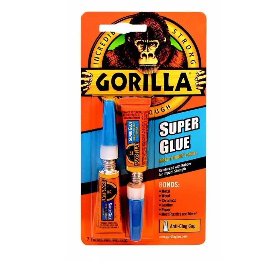 Gorilla Super Glue Gel packaging showing two 3g tubes with blue caps and orange and black branding featuring a gorilla logo, anti-clog cap feature highlighted, bonds metal wood ceramics leather and plastics