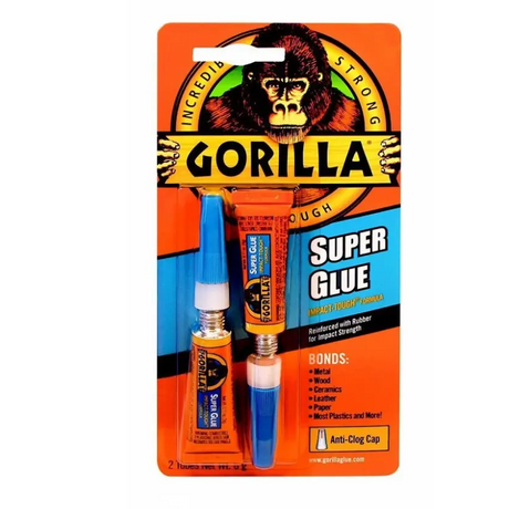 Gorilla Super Glue Gel packaging showing two 3g tubes with blue caps and orange and black branding featuring a gorilla logo, anti-clog cap feature highlighted, bonds metal wood ceramics leather and plastics