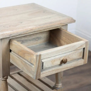 Light wood one drawer end table with round brass knob, open drawer showing interior, turned legs, rustic farmhouse style