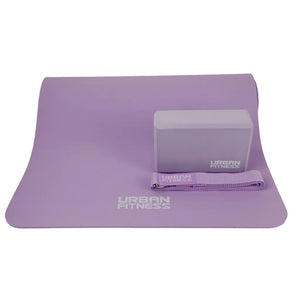 Purple Urban Fitness yoga kit set including rolled yoga mat, foam block and stretch strap on white background