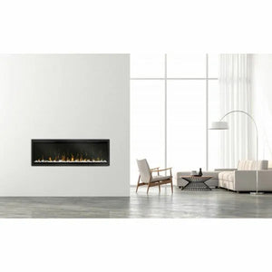 Dimplex IgniteXL 50 inch frameless electric fireplace with black surround mounted on white wall in modern minimalist living room with grey concrete floor, wooden armchair, curved floor lamp and white sofa