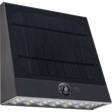 Black solar-powered outdoor wall light with integrated LED panel and motion sensor, featuring dark grey casing and crystalline solar panel on angled top surface