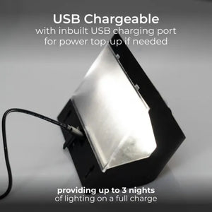 USB chargeable portable LED lantern with black exterior and white diffused light panel, featuring built-in USB charging port for power top-up, providing up to 3 nights of lighting on full charge