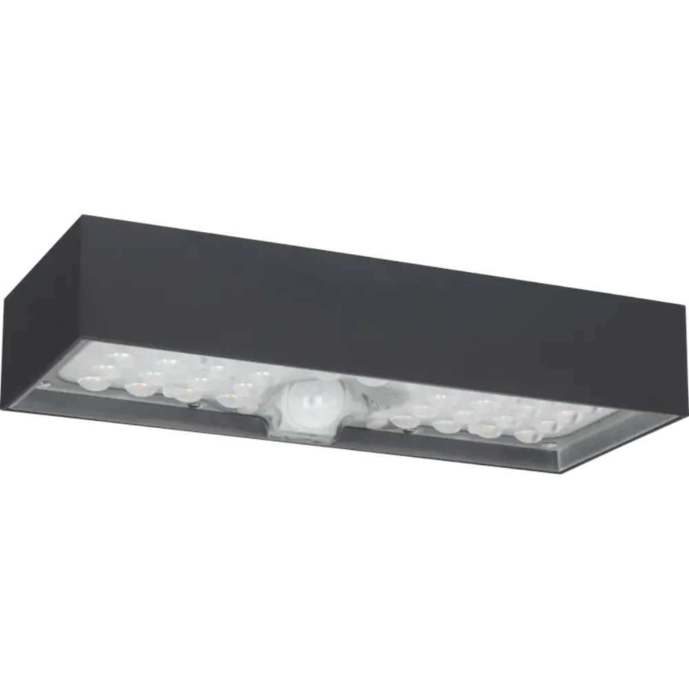 Luceco slate grey solar brick light with PIR sensor and LED lighting mounted horizontally against white background