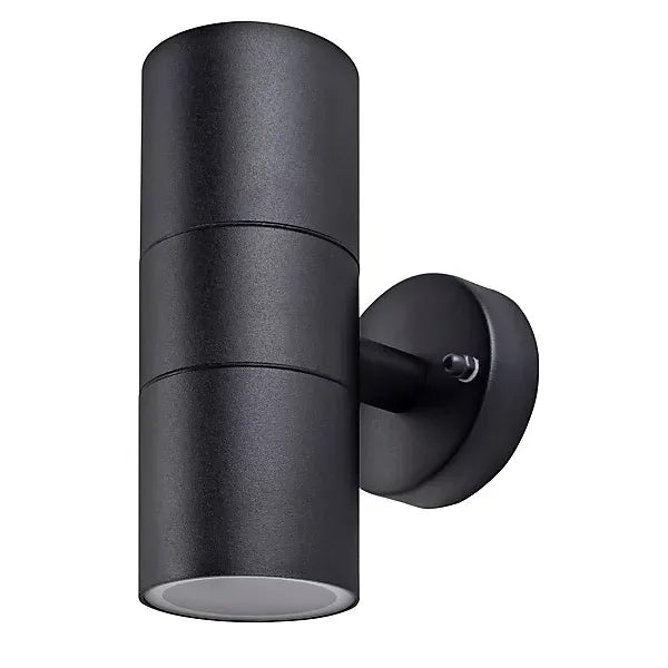 Black stainless steel cylindrical up down wall light with circular mounting bracket and dual light apertures on white background