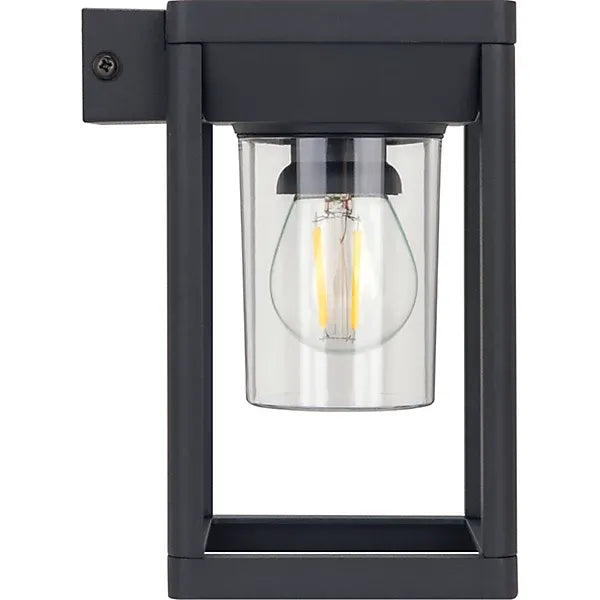Black metal outdoor solar wall lantern with clear glass cylinder housing warm white LED filament bulb and PIR motion sensor