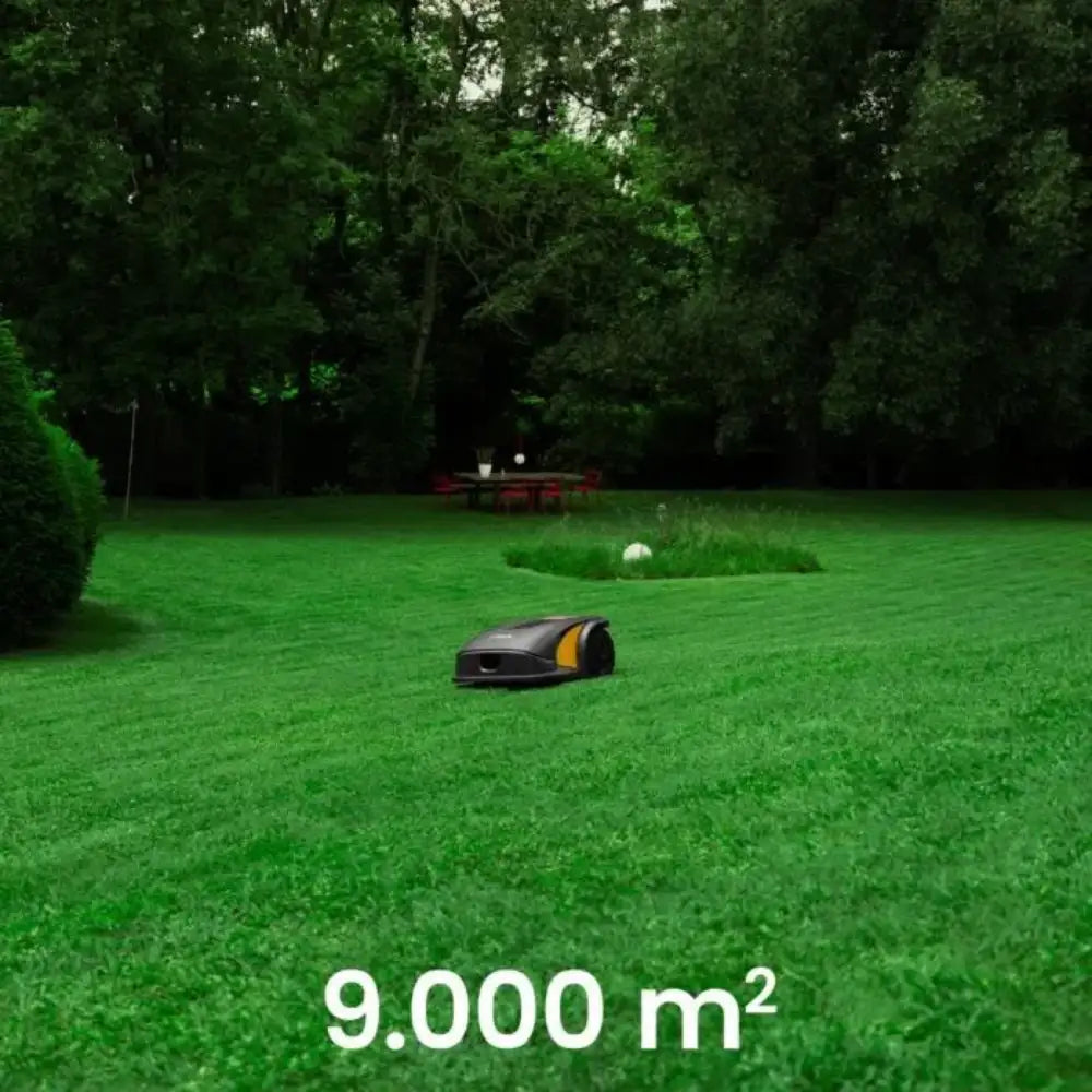 Robotic lawn mower on a green lawn with trees in the background, indicating coverage of 9,000 square meters.