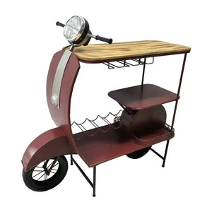 Red vintage Vespa scooter-inspired wine rack bar with wooden top shelf, burgundy metal body, chrome headlight, black metal frame shelving, and black wheels