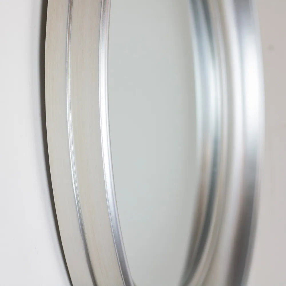 Tara Lane Lyla Round Mirror 90cm in champagne gold finish showing reflective curved glass surface and metallic frame detail