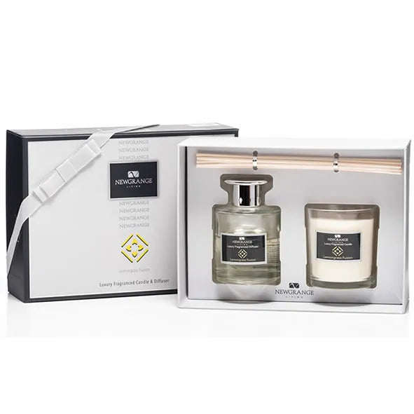 Newgrange Living luxury candle and diffuser gift set in black and white packaging featuring a glass fragrance diffuser with clear liquid and a white scented candle with black label, lemongrass fusion scent