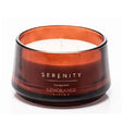 Serenity Bergamot luxury scented candle by Newgrange Living in amber glass jar with white wax and black rim