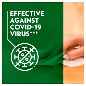 Dettol antibacterial surface cleaning wipes product packaging featuring green and orange design with white text stating Effective Against COVID-19 Virus and virus icon symbol, showing hand holding white wipe on right side