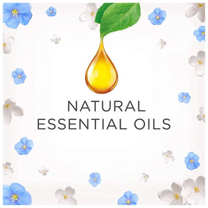 Natural essential oils product packaging featuring a golden yellow oil droplet with green leaf, surrounded by blue forget-me-not flowers and white jasmine blossoms on a light background