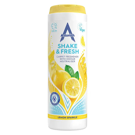 Astonish Shake and Fresh Lemon Sparkle carpet freshener 400g shaker bottle with yellow cap, white label featuring lemon imagery and blue accents, displaying cruelty-free and vegan certifications