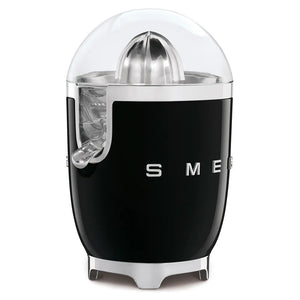 Smeg 50's retro style electric citrus juicer in black with stainless steel dome top and chrome accents, featuring a clear juice jug spout and white band detail