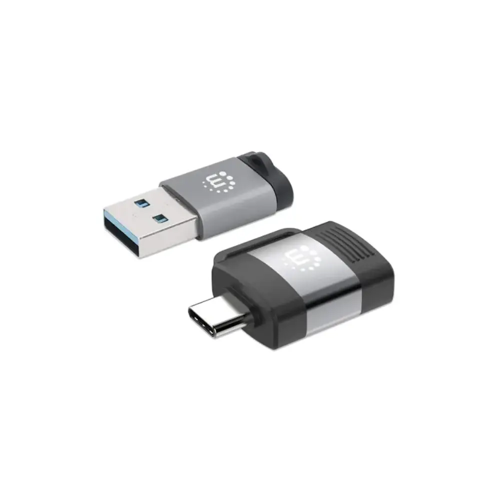 Two Manhattan USB adapters displayed on white background - top showing silver and gray USB-A to USB-C adapter with white LED indicator, bottom showing black and silver USB-C to USB-A adapter with ribbed grip design